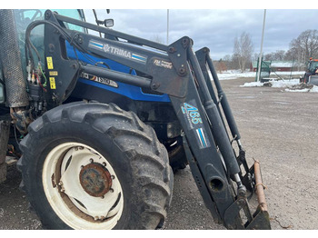 Фронтальний навантажувач для трактора NEW HOLLAND