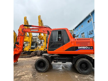 15ton Used Wheel Excavator Doosan Dh150w-7 Made In Korea For Sale With Original Good Running Condition In Shanghai в лізинг 15ton Used Wheel Excavator Doosan Dh150w-7 Made In Korea For Sale With Original Good Running Condition In Shanghai: фото 1