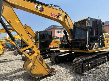 Гусеничний екскаватор CATERPILLAR 312D2