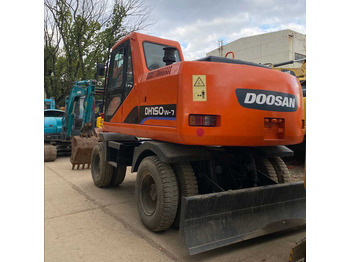 Гусеничний екскаватор DOOSAN