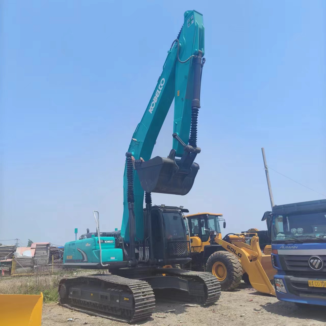 Гусеничний екскаватор KOBELCO