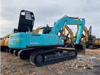 Гусеничний екскаватор KOBELCO