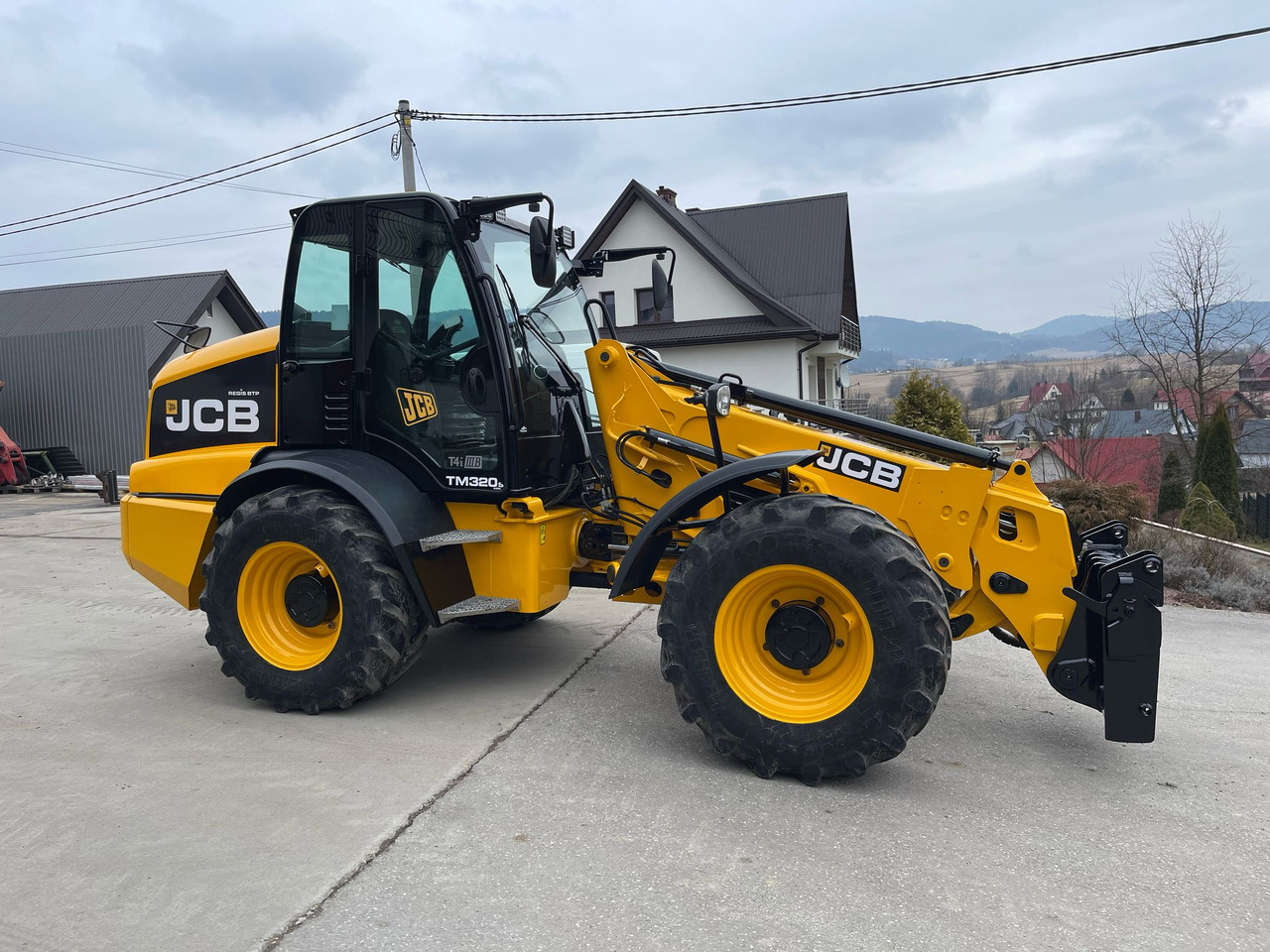 Телескопічний фронтальний навантажувач JCB TM320s: фото 11